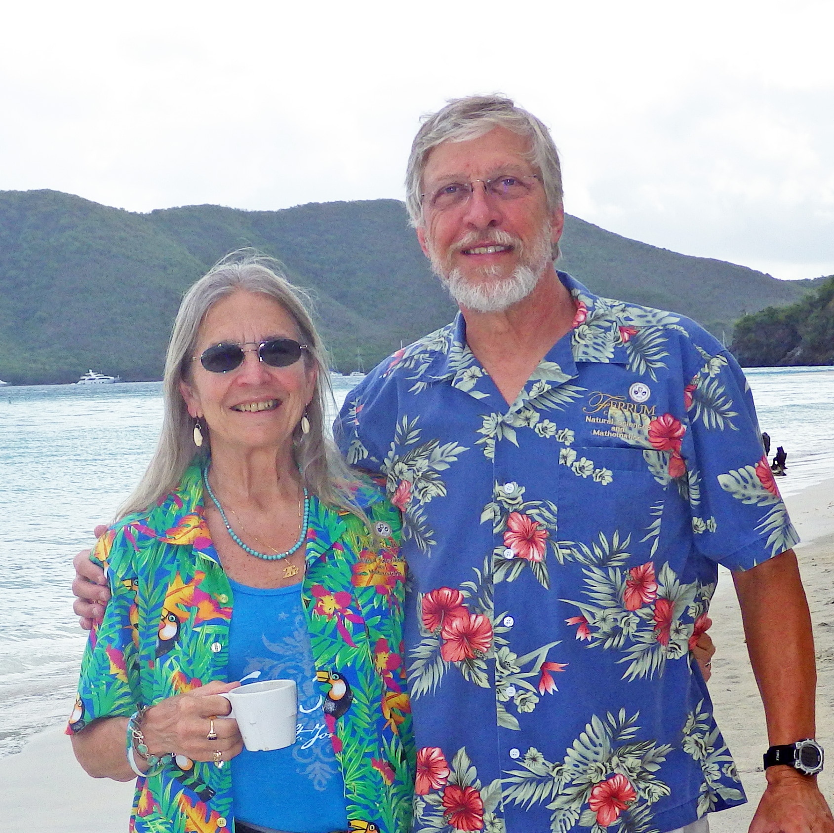 Drs. Carolyn Thomas and Bob Pohlad stand on St. John beach, Virgin Islands, in 2013.