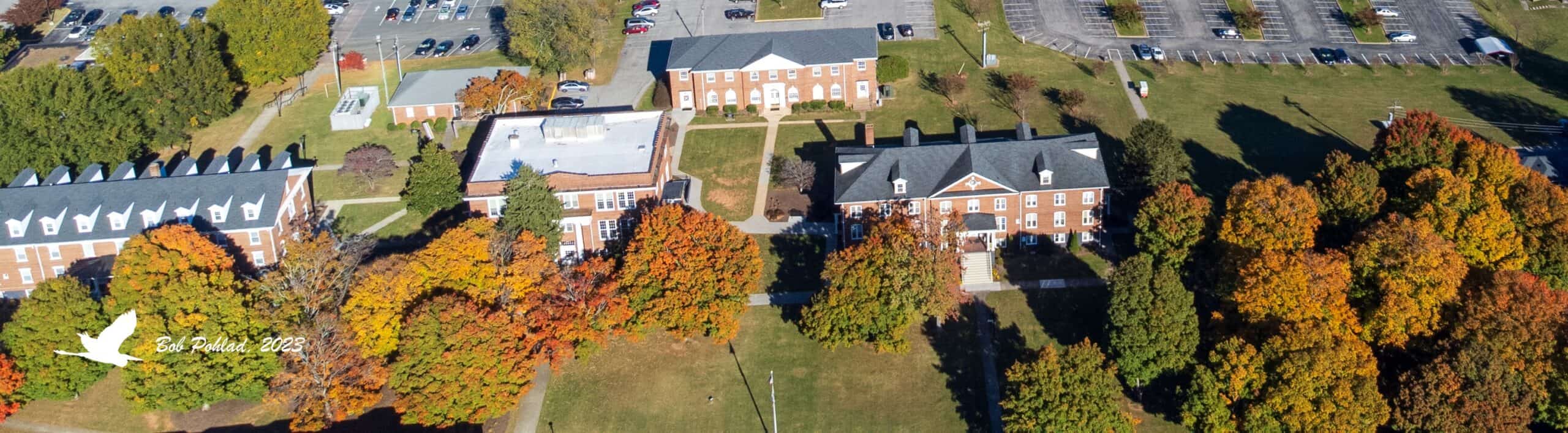 Drone photo of campus with brick buildings John Wesley, Beckham, Britt and Richeson showing from above