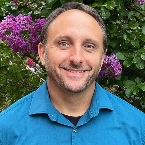 Headshot of professor Brian Suttell