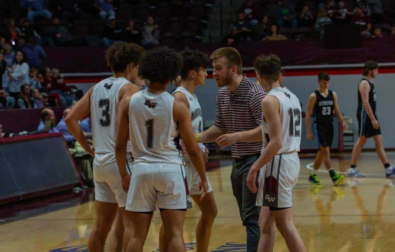 josh reeves coaching basketball team at game 2023