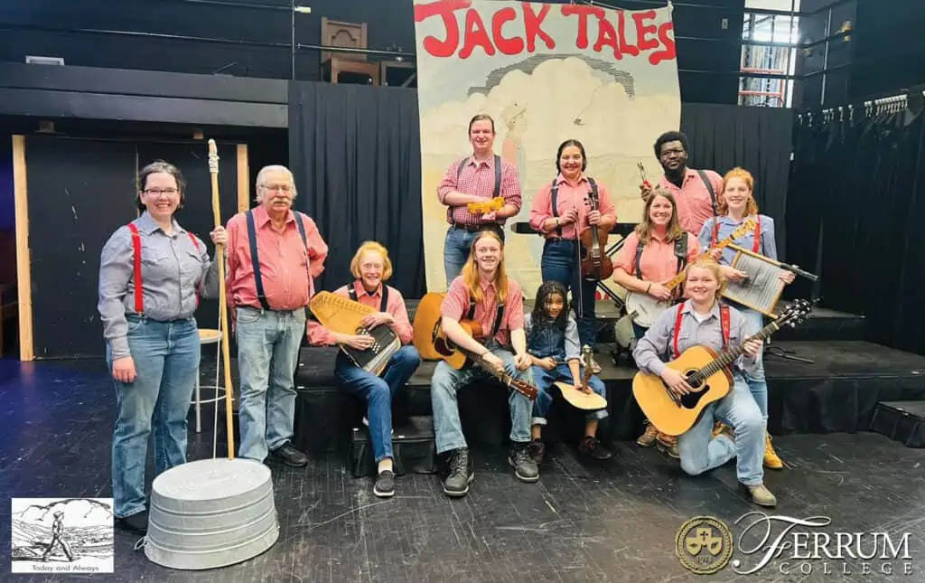 Jack Tale Players ages 8 to 80 pose with traditional instruments in The Rex Stephenson Theatre.