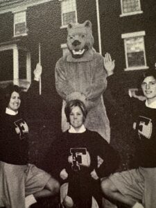 1965 gold Panther costume with 3 cheerleaders