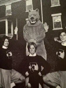 1965 gold Panther costume with 3 cheerleaders