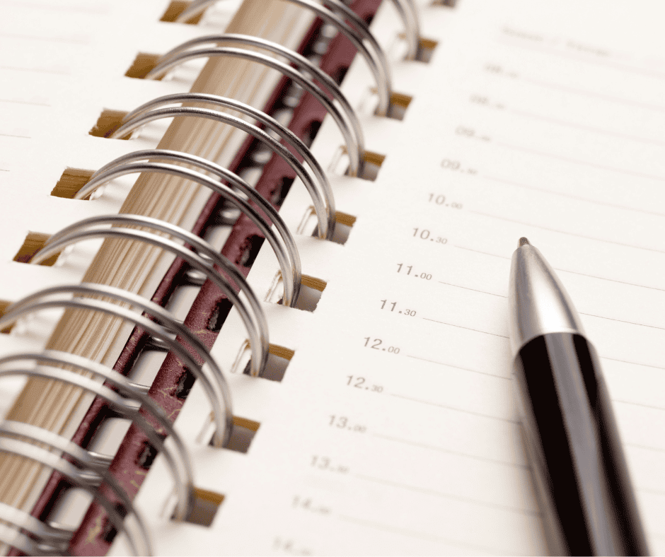 A schedule planner page with pen.