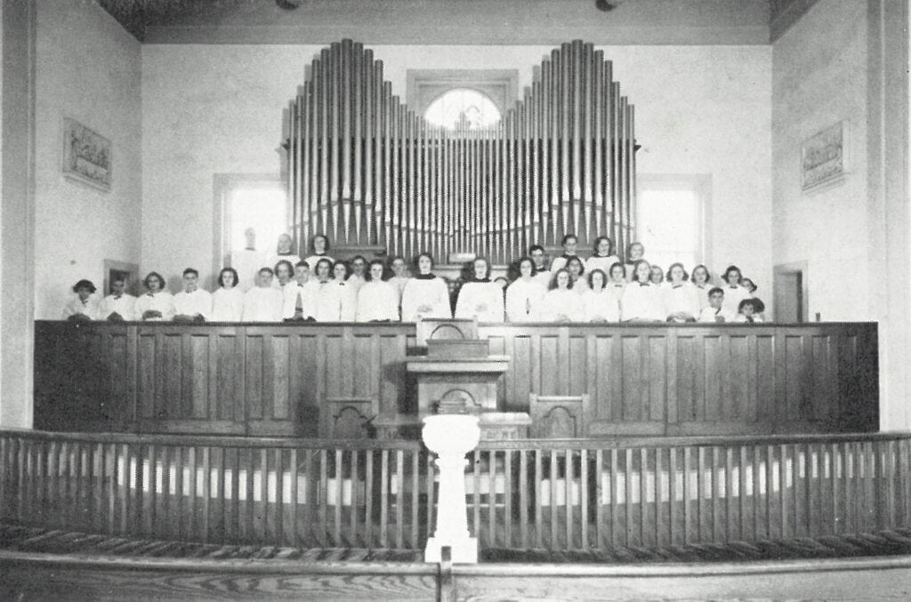 1938 yearbook photo of big organ and choir loft in Schoolfield Memorial Chapel