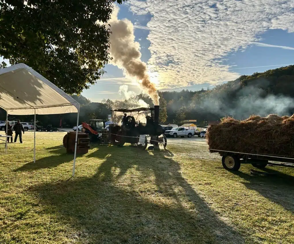 Antique farm steam engine in early folklife festival fog 2025