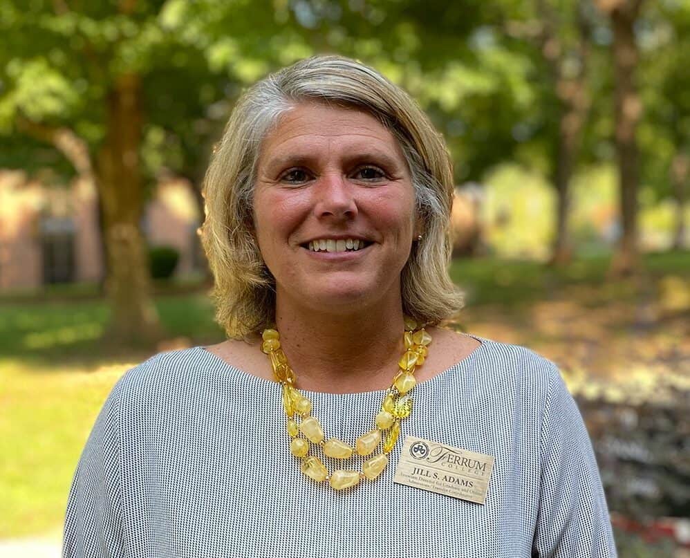 Headshot of Ferrum College staff Jill Adams standing outside on campus.