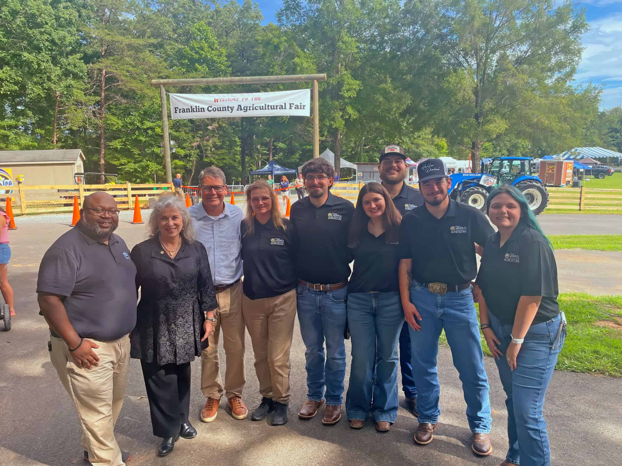 Ferrum College staff, Ag Club members, and President Martin pose at the Franklin County Fair with Secretary of Agriculture Matt Lohr