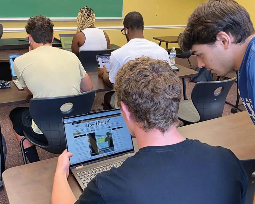 Ferrum College students work on the College's newspaper, The Iron Blade