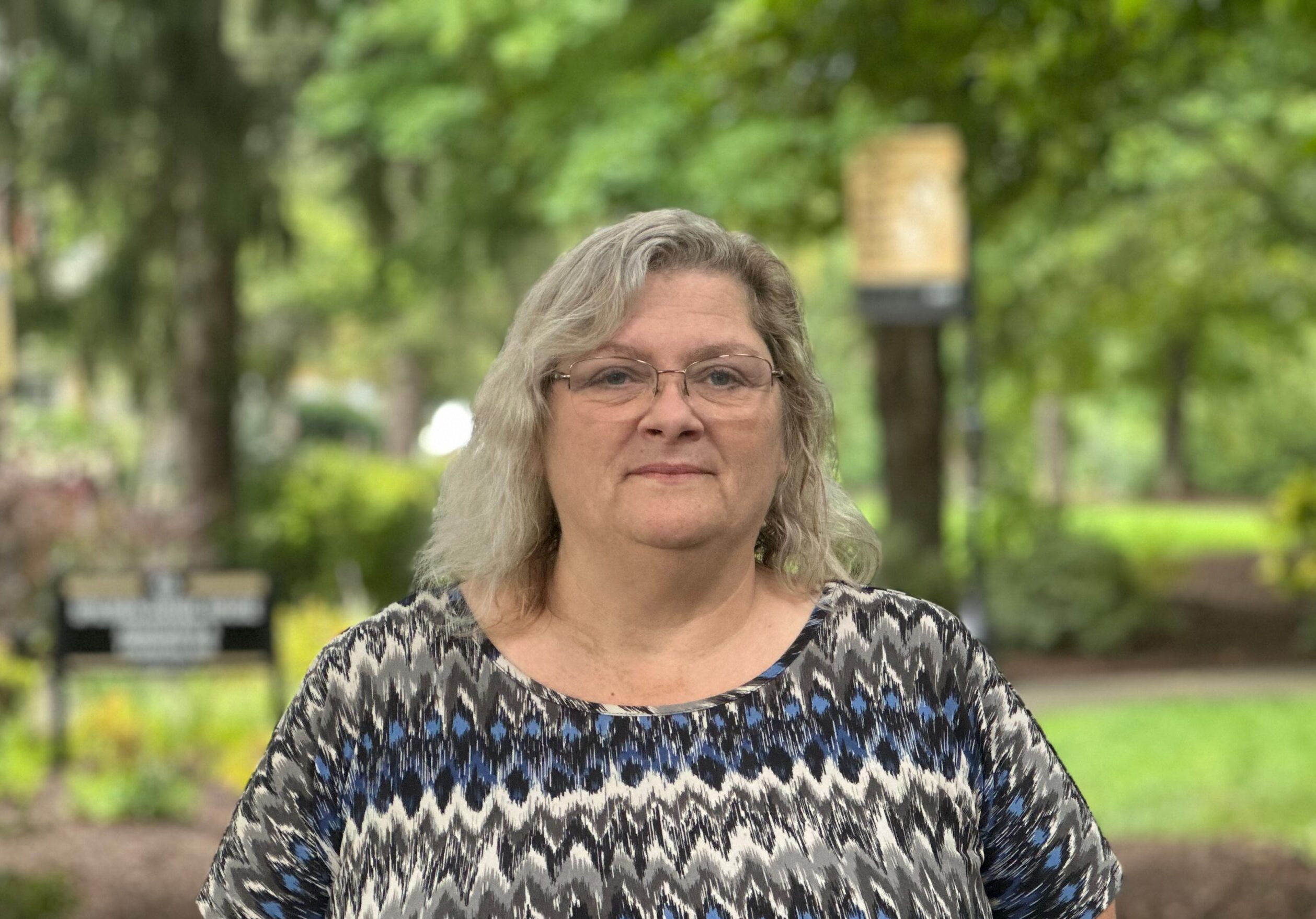Photograph of Fredah Farris taken outside at Ferrum College on a pretty summer day