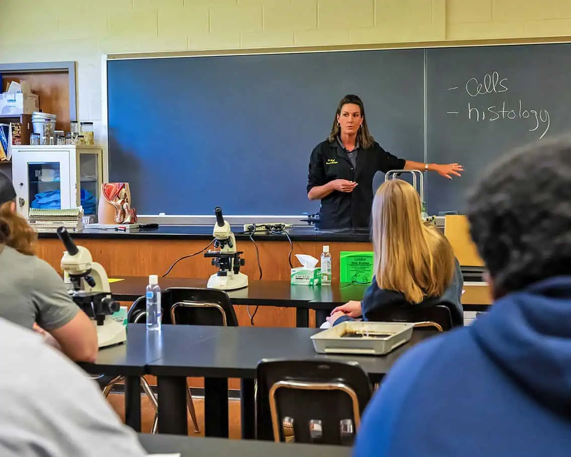 Ferrum College's Dr. Katie Goff teaching a group of students in the anatomy lab
