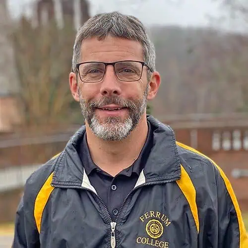 Headshot of Ferrum College staff Jason Powell standing outside on campus