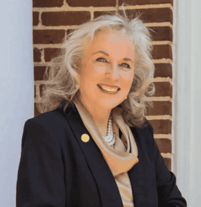 Ferrum College President Mirta Martin outside Beckham Hall