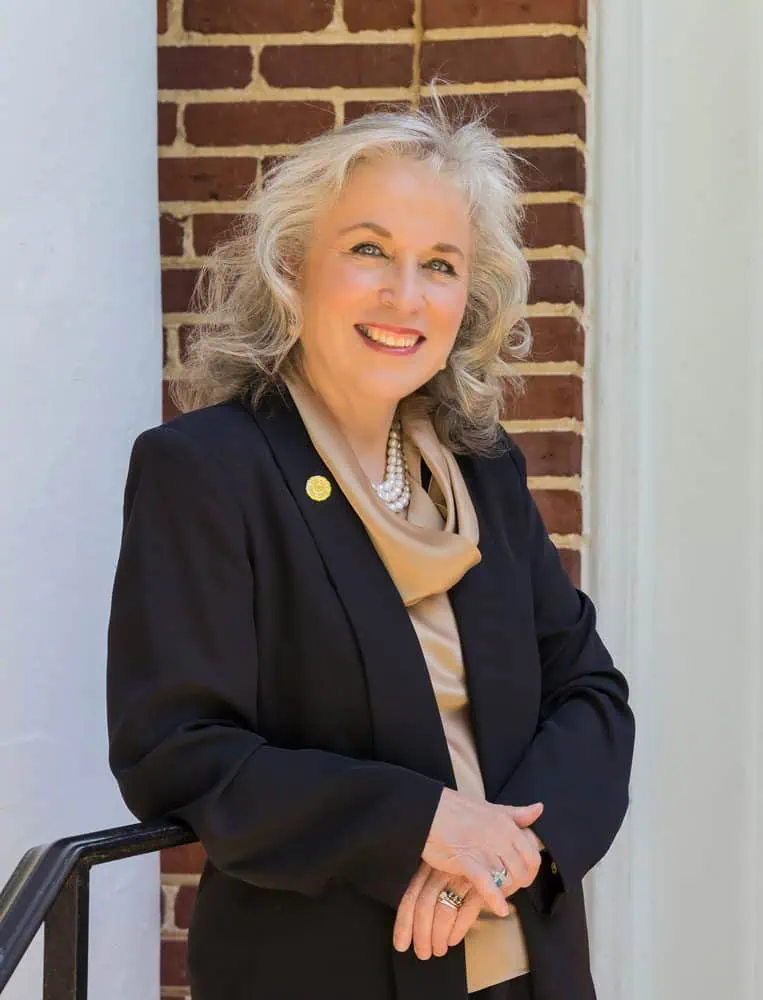 Ferrum College President Mirta Martin outside Beckham Hall