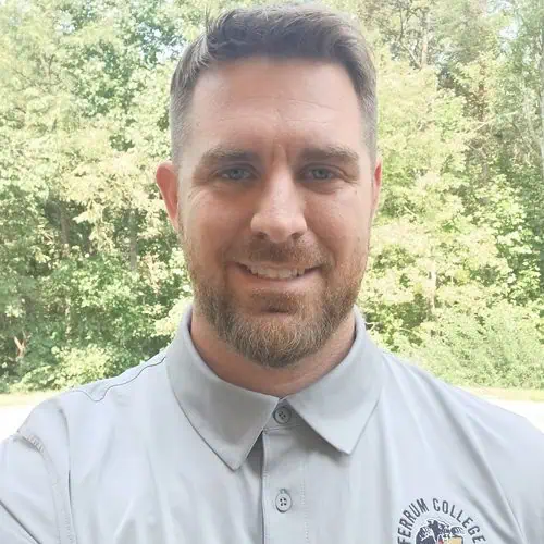 dane fausnacht in ferrum polo in front of tress for staff photo
