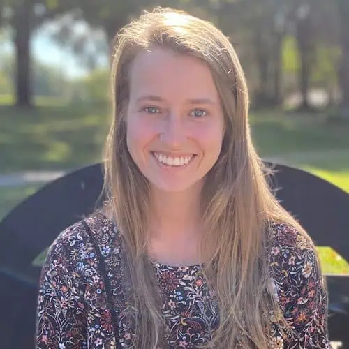 hailey turner in floral shirt on ferrum bench outside for staff photo