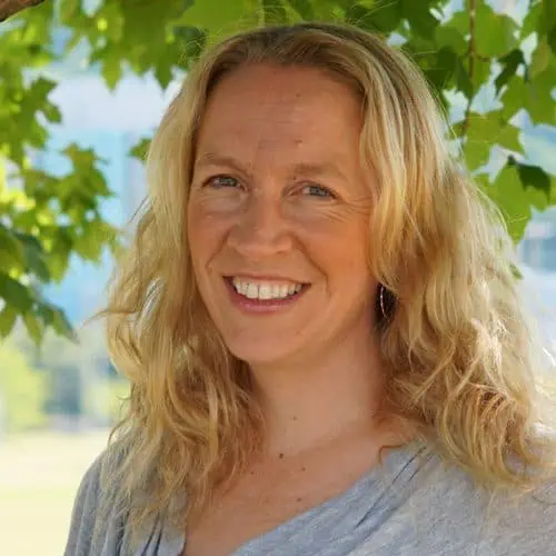 johanna ferguson in gray top under a tree for staff photo